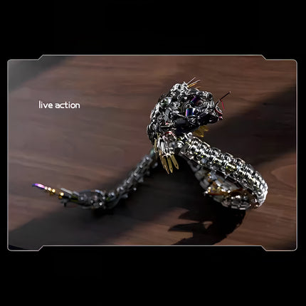 Live action" shot of a metal model kit snake, perfect for collectors seeking unique mechanical animal figures for display.