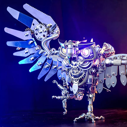 Articulated metal model kit owl with one wing spread, a dynamic metallic 3D puzzle showcasing functional mechanical metal design.