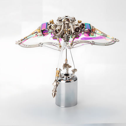  Front view of a futuristic metal model kit flying ray, an eye-catching metallic 3D puzzle / puzzle mécanique métal with transparent iridescent wings