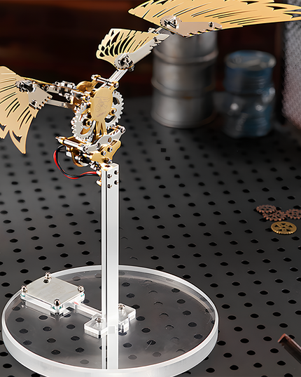 Steampunk Mechanical Bird 3D Puzzle Metal Kit (Golden Aesthetic) - A captivating DIY toy for mechanics and steampunk enthusiasts, this self-assembled piece showcases a mechanical bird with golden metallic wings, intricate gear-driven structures, and a dynamic design. It embodies the fusion of retro mechanical art and kinetic innovation, inviting you to craft a visually striking piece of steampunk mechanical artistry with precision and aesthetic sensibility through this 3D Puzzle Metal Kit.