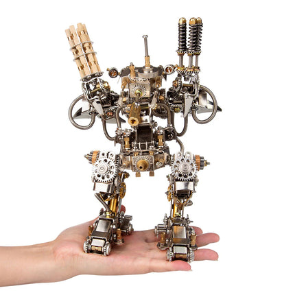 A complete mechanical steampunk mech robot metal model 3D puzzle Metal Kit, held in a hand to show scale, featuring intricate chrome and brass components, prominent gears, and various armaments. This impressive steampunk puzzle is a perfect collectible and display piece.