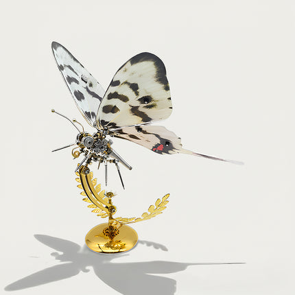 Swallowtail-inspired mechanical butterfly DIY 3D puzzle metal kits - nature-themed assembly craft with black-white wing patterns & red accents, finished as distinctive funny table decor for living rooms/collection shelves, featuring intricate gearwork & gilded fern stand