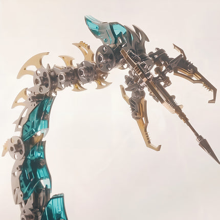 Close-up of the mechanical scorpion's tail and stinger, featuring transparent green segments and sharp metallic claws. This DIY 3D puzzle highlights the intricate engineering of the Metal Kits, making a captivating funny table display