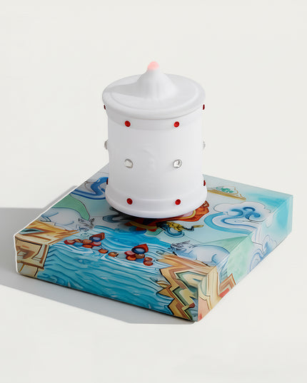 Table Funny Magnetic Levitation Zen Lamp Artwork - A distinctive creation for cultural enthusiasts, spiritual seekers, and decor admirers, this piece from Table Funny features a magnetic levitation zen lamp with a vividly illustrated base inspired by Tibetan art, a traditional white prayer wheel-inspired design with red accents, and a thematic spiritual design. Highlighted by its floating zen-inspired silhouette, magnetic levitation technology, Tibetan cultural elements, and vibrant artistic detailing