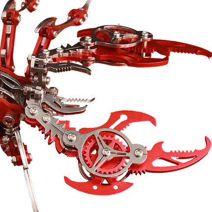 Close-up view of the mechanical claws and gear structure on the red scorpion **metal model kit**, highlighting the intricate details of this **puzzle mécanique métal**.