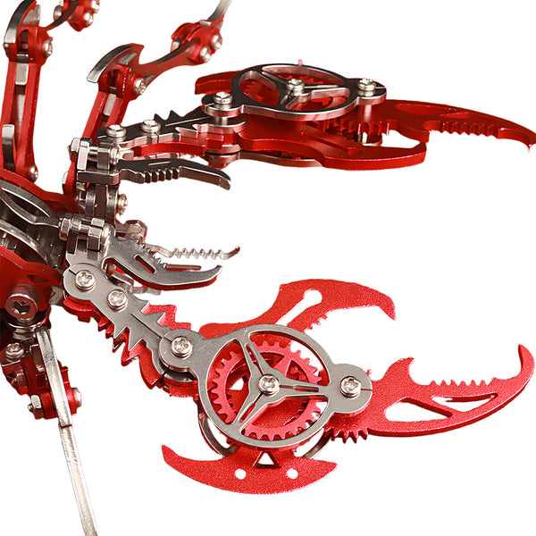 Close-up view of the mechanical claws and gear structure on the red scorpion **metal model kit**, highlighting the intricate details of this **puzzle mécanique métal**.
