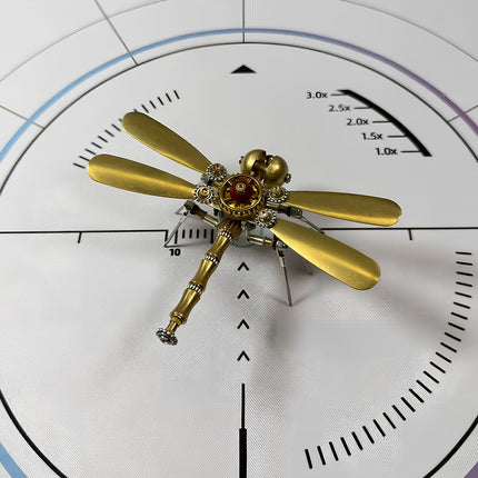 Assembled 3D puzzle of a steampunk dragonfly, showcasing intricate gears, metallic textures, and a charming, antique-inspired design.
