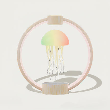 Table Funny Magnetic Levitation Jellyfish Decorative Lamp Artwork - An innovative creation for home decor lovers, tech enthusiasts, and design admirers, this piece from Table Funny features a magnetic levitation jellyfish decorative lamp with a wooden circular frame, gradient color lighting, and a minimalist design. Highlighted by soft pastel hues, a floating jellyfish silhouette, magnetic levitation technology, and warm wooden textures