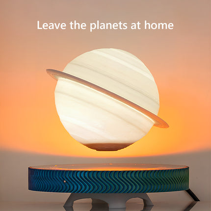 Magnetic levitating Saturn lamp creating a warm sunset ambiance for home decor