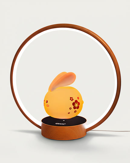 Table Funny Magnetic Levitation Rabbit Lamp Artwork - A charming creation for home decor lovers, cultural design admirers, and lighting enthusiasts, this piece from Table Funny features a magnetic levitation rabbit-shaped lamp with a wooden circular frame, warm ambient lighting, and an adorable rabbit design adorned with floral motifs. Highlighted by its cute floating rabbit silhouette, magnetic levitation technology, traditional-inspired aesthetic, and natural wooden textures