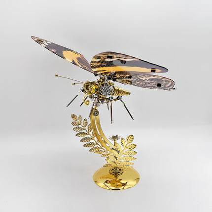 A sophisticated steampunk puzzle, this mechanical butterfly features elegant brown and yellow patterned wings, gracefully poised on an ornate golden stand. This exquisite metal model exemplifies intricate mechanical steampunk design, making it a compelling 3D puzzle Metal Kit for enthusiasts or a charming steampunk mech decorative piece that blends natural beauty with industrial artistry.