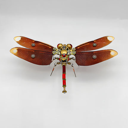 A striking frontal view of a steampunk puzzle, a mechanical dragonfly with wide, reddish-brown wings and a vibrant red and gold body, set against a clean white background. This symmetrical metal model highlights the intricate mechanical steampunk design, making it an impressive 3D puzzle Metal Kit for hobbyists or a bold steampunk mech display piece that showcases its captivating coloration and detailed craftsmanship.
