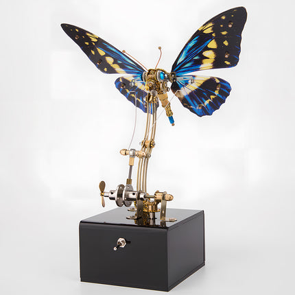 Blue-winged steampunk butterfly metal model on an interactive stand, a captivating funny table display. This DIY 3D puzzle metal kit is a perfect blend of natural inspiration and mechanical innovation.