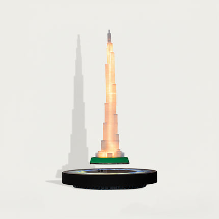 Table Funny Magnetic Levitation Iron Tower Artwork - An innovative creation for architecture lovers, tech enthusiasts, and design admirers, this piece from Table Funny features a magnetic levitation model of the Iron Tower with a sleek black base, warm LED lighting, and a realistic architectural design. Highlighted by its precise structural detailing, floating landmark silhouette, magnetic levitation technology, and striking shadow effects