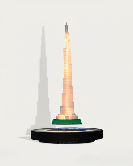 Table Funny Magnetic Levitation Iron Tower Artwork - An innovative creation for architecture lovers, tech enthusiasts, and design admirers, this piece from Table Funny features a magnetic levitation model of the Iron Tower with a sleek black base, warm LED lighting, and a realistic architectural design. Highlighted by its precise structural detailing, floating landmark silhouette, magnetic levitation technology, and striking shadow effects