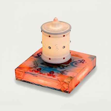 Table Funny Magnetic Levitation Zen Lamp Artwork - A distinctive creation for cultural enthusiasts, spiritual seekers, and decor admirers, this piece from Table Funny features a magnetic levitation zen lamp with a vividly colored, artfully illustrated base inspired by Tibetan art, a luminous white prayer wheel-inspired design with red accents and engraved spiritual symbols, and a thematic spiritual design. Highlighted by its floating, glowing zen-inspired silhouette, magnetic levitation technology