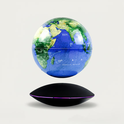 Table Funny Magnetic Levitation Globe Artwork - An innovative creation for geography lovers, education enthusiasts, and tech admirers, this piece from Table Funny features a magnetic levitation world globe with a sleek black UFO-shaped base, vibrant geographic detailing with multilingual labels, and an accurate Earth replication. Highlighted by its floating planetary silhouette, magnetic levitation technology, precise cartographic information, and futuristic design contrast