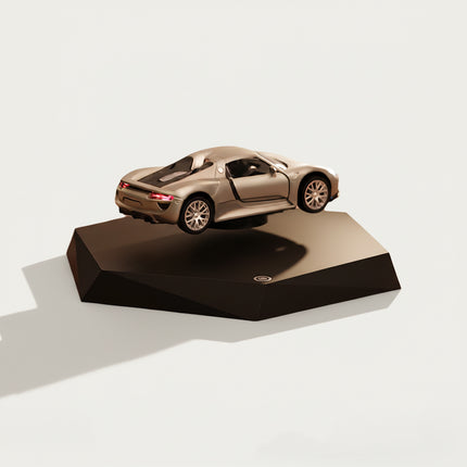 Table Funny Magnetic Levitation Car Model Artwork - An innovative creation for automotive enthusiasts, tech lovers, and decor admirers, this piece from Table Funny features a magnetic levitation sports car model with a geometric dark base, a detailed silver sports car replica, and a sleek design. Highlighted by its floating automotive silhouette, magnetic levitation technology, accurate car detailing, and modern structural design, it’s a captivating decor piece that merges automotive art