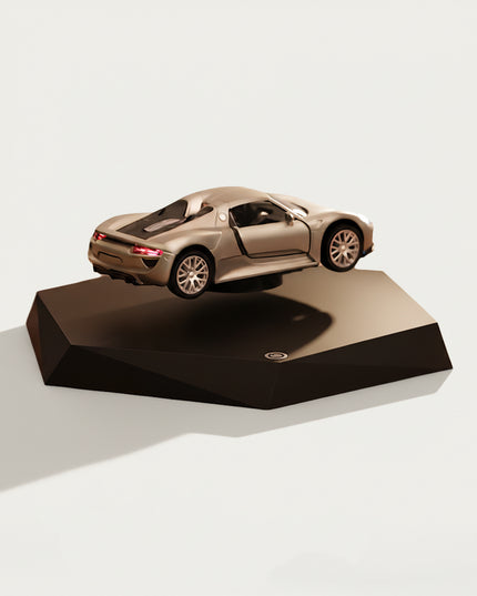 Table Funny Magnetic Levitation Car Model Artwork - An innovative creation for automotive enthusiasts, tech lovers, and decor admirers, this piece from Table Funny features a magnetic levitation sports car model with a geometric dark base, a detailed silver sports car replica, and a sleek design. Highlighted by its floating automotive silhouette, magnetic levitation technology, accurate car detailing, and modern structural design, it’s a captivating decor piece that merges automotive art
