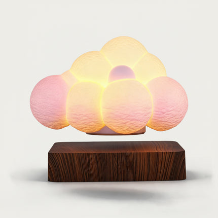 Table Funny Magnetic Levitation Cloud Lamp Artwork - A charming creation for home decor lovers, whimsical design admirers, and lighting enthusiasts, this piece from Table Funny features a magnetic levitation cloud-shaped lamp with a natural wooden base, a soft-glowing, multi-hued cloud design with textured detailing, and a dreamy aesthetic. Highlighted by its floating, luminous cloud silhouette, magnetic levitation technology, gentle color gradients, and organic wood texture integration