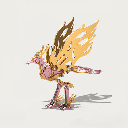Pink Bifang Bird 3D puzzle Metal Kit - A charming fun toy for mythology and craft lovers, this DIY assembled table funny piece features a delicate, intricate, and legendary mythical bird design. It invites you to craft a piece of legend part by part, and the finished pink Bifang Bird, with its soft pink and gold details, becomes an elegant desktop ornament, making it a captivating fun toy full of mythical allure.