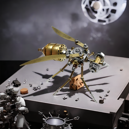This is a partially assembled steampunk mechanical wasp (from 3D metal puzzles), featuring brass/silver alloy parts (blade wings, gears, articulated legs). The scene shows scattered components, highlighting the hands-on assembly process.It’s a detailed decorative collectible that blends 3D puzzle craftsmanship with steampunk insect styling.