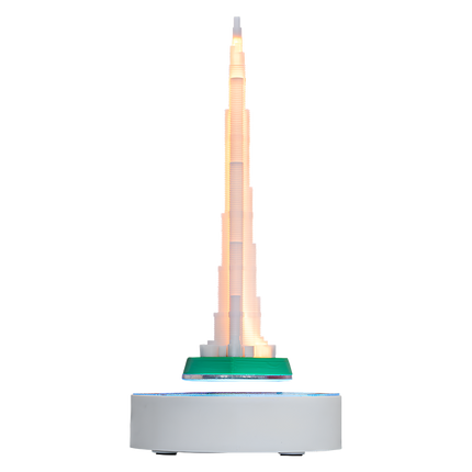 Floating skyscrapers, resembling landmark towers, hover contactlessly atop magnetic levitation white circular bases — modern magnetic levitation decor.