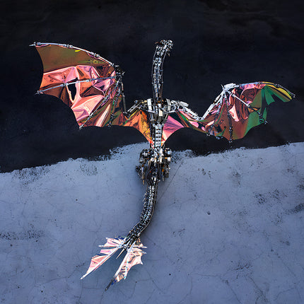 Iridescent "Dragon" mecha model: Stunning holographic wings (shifting from fiery copper to vivid emerald in light), intricately interlocked polished metallic skeletal segments, sharply defined clawed limbs, & a sleek, elongated frame—this masterfully assembled 3D puzzle metal kit blends futuristic mechanical precision with eye-catching color-shifting aesthetics, making it a mesmerizing display piece.