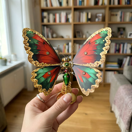 A finished steampunk puzzle butterfly from premium 3D puzzle Metal Kits, displaying its intricate details and hand-held size.