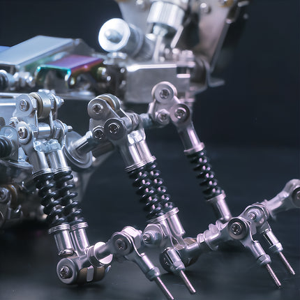 Close-up of the articulated, spring-loaded legs of a mechanical scorpion, highlighting the intricate engineering of this metal model kit. This metallic 3D puzzle showcases remarkable detail.