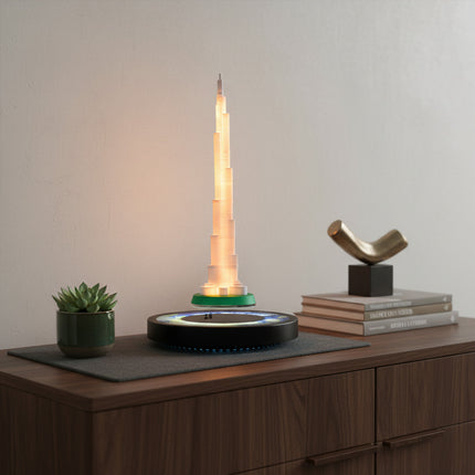 Maglev skyscraper lamps perched atop wooden storage cabinets, flanked by succulent plants and abstract sculptures—modern magnetic levitation home decor