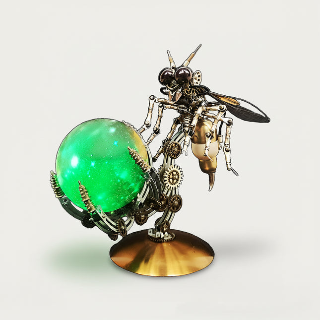 Steampunk bee metal model with green glowing orb on a copper base — a funny DIY 3D puzzle Metal Kits by table funny for table display.