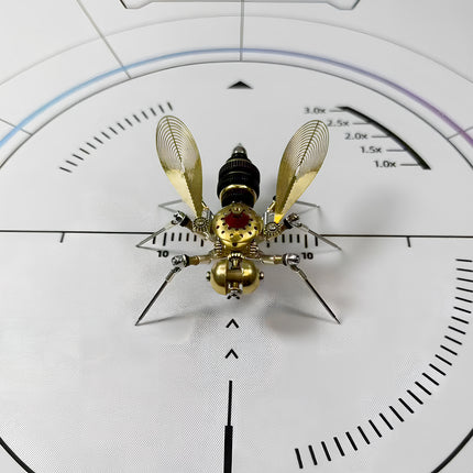 Close-up view of a sophisticated 3D puzzle metal kit depicting a steampunk bee, emphasizing the fine details and the polished metallic finish of the assembled model.