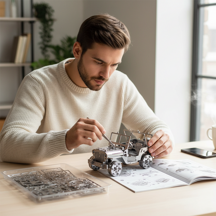  Man assembling a detailed Jeep Metal Kits model at his desk, engaging in a rewarding DIY 3D puzzle hobby. An excellent addition to any funny table display.