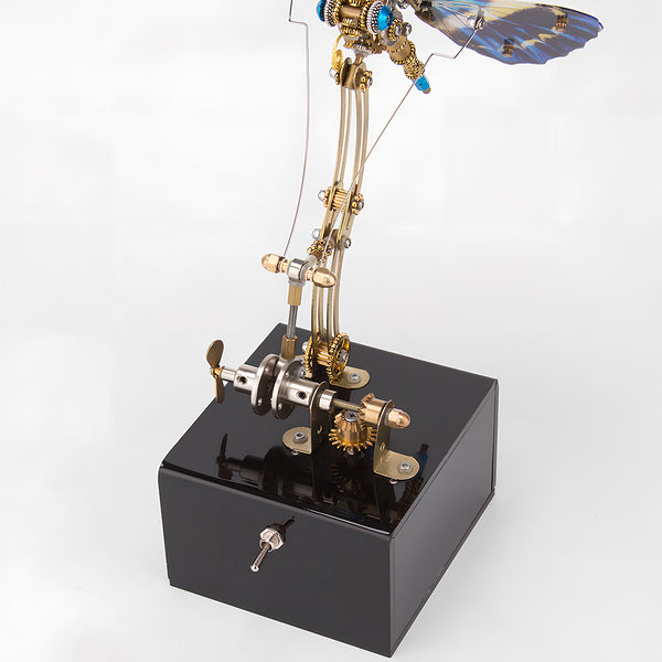 Detailed mechanical base of a blue-winged steampunk butterfly metal model, an impressive funny table display component. This DIY 3D puzzle metal kit's base highlights intricate gear work and functional design.