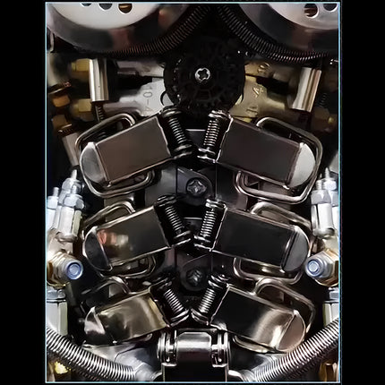 Overhead view of interconnected mechanical steampunk components, featuring springs, bolts, and metallic plates, illustrating the complex assembly of a 3D puzzle Metal Kit.
