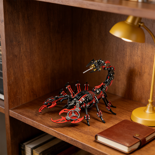  A finely crafted red and black steampunk mech scorpion maquette en metal, poised on a wooden bookshelf under the warm light of a golden lamp. This detailed 3D metal model kit serves as a captivating steampunk puzzle and an elegant decorative piece.