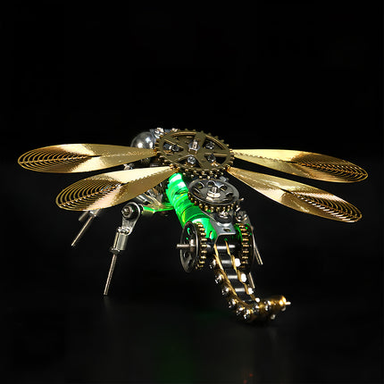 Front-facing view of a detailed mechanical steampunk dragonfly metal model, featuring golden wings, intricate gears, and a vibrant green glowing body. An impressive 3D puzzle metal kit for collectors. 