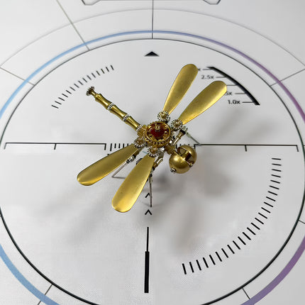 A beautifully crafted steam punk mech dragonfly model, a metal kit designed as a sophisticated steampunk puzzle for hobbyists and collectors.