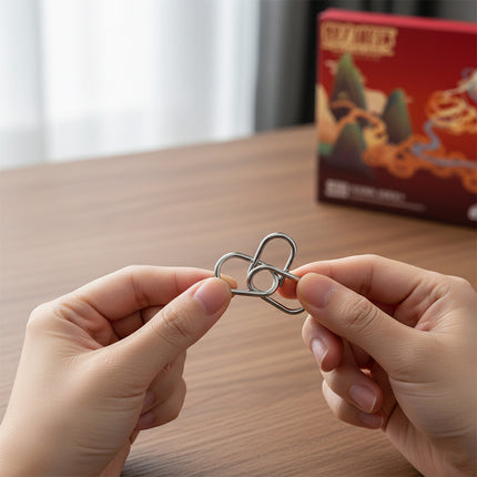  Hands solving a metal link puzzle, a satisfying DIY brain teaser from our Metal Kits collection, ideal for a funny table activity or stress relief.