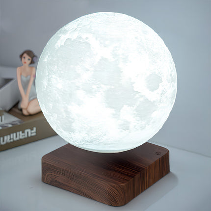 Realistic magnetic levitating 3D moon lamp glowing above a dark wood-grain base