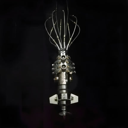 Vertical front view of an assembled 3D metal mechanical squid model with extended metal tentacles and detailed mechanical core on a solid black background.