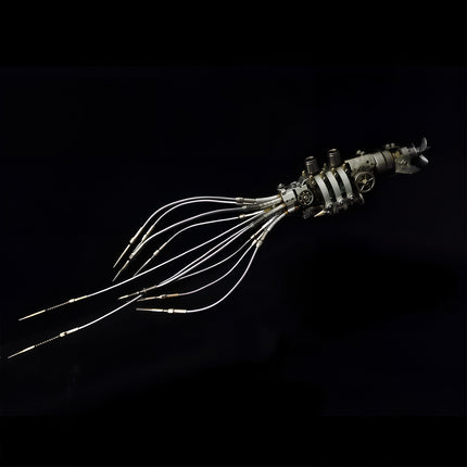 Top-down angular view of an assembled 3D metal mechanical squid model showing extended metallic tentacles and detailed torso mechanism on a solid black background.