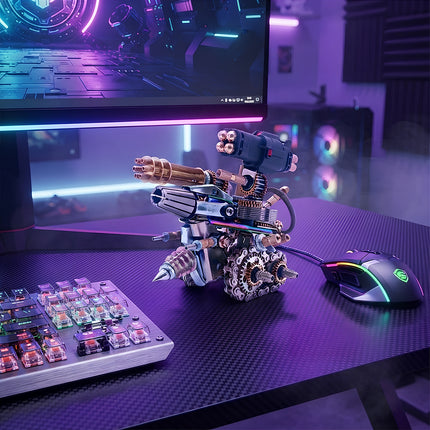 A futuristic 3D metal mechanical tank turret model displayed on a carbon fiber gaming desk with RGB keyboard and mouse.