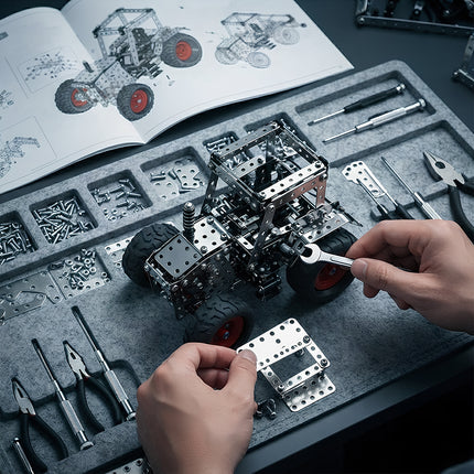 Hands-on assembly scene of a metal mechanical tractor puzzle showing organized hardware, tools, and step-by-step instruction manual.