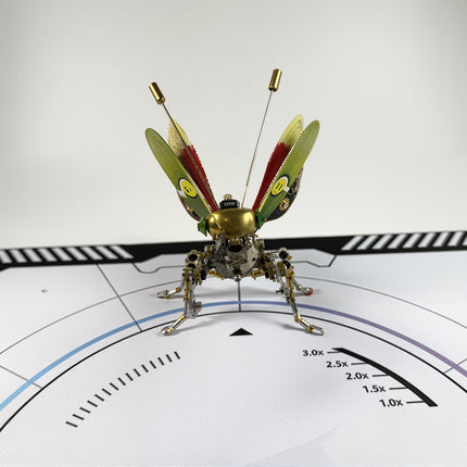 Challenging steampunk puzzle of a robotic praying mantis on a technical mat, showcasing high-precision metal craftsmanship in our metal models.