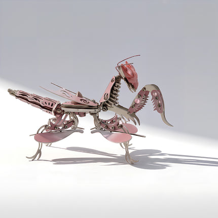 Profile of a mechanical steampunk praying mantis built from a 3D puzzle metal kit with intricate joints.