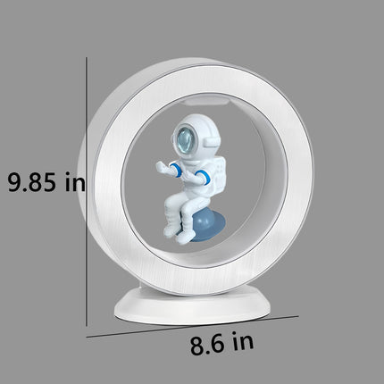 9.85″H x 8.6″W white LED halo lamp with a floating astronaut figurine suspended inside a brushed-metal ring on a magnetic levitation base – modern anti-gravity desk décor