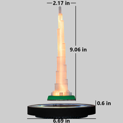Size guide for Floating tower night light: 9.06in tall tower floating over a 6.69in base