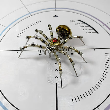 Steampunk spider 3D puzzle metal kit positioned on a measurement grid, highlighting its metallic sheen, golden abdomen, and intricate mechanical steampunk details.